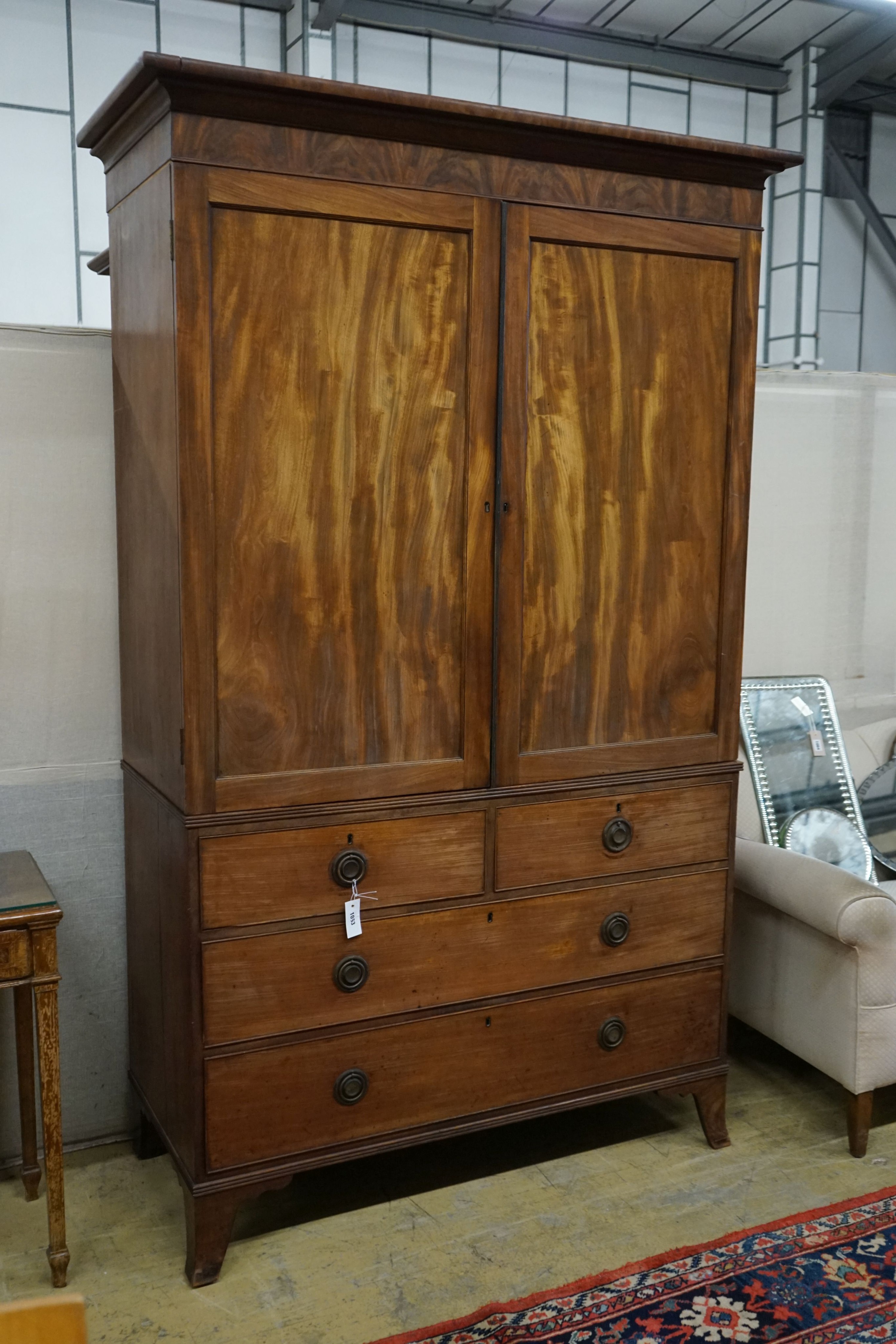 A Regency mahogany linen press, length 128cm, depth 55cm, height 218cm